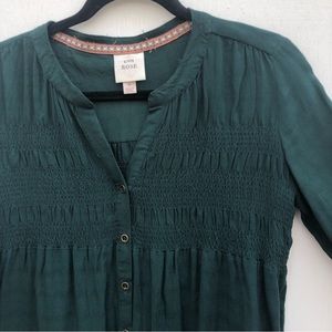 Forest green smocked long sleeve button down blouse